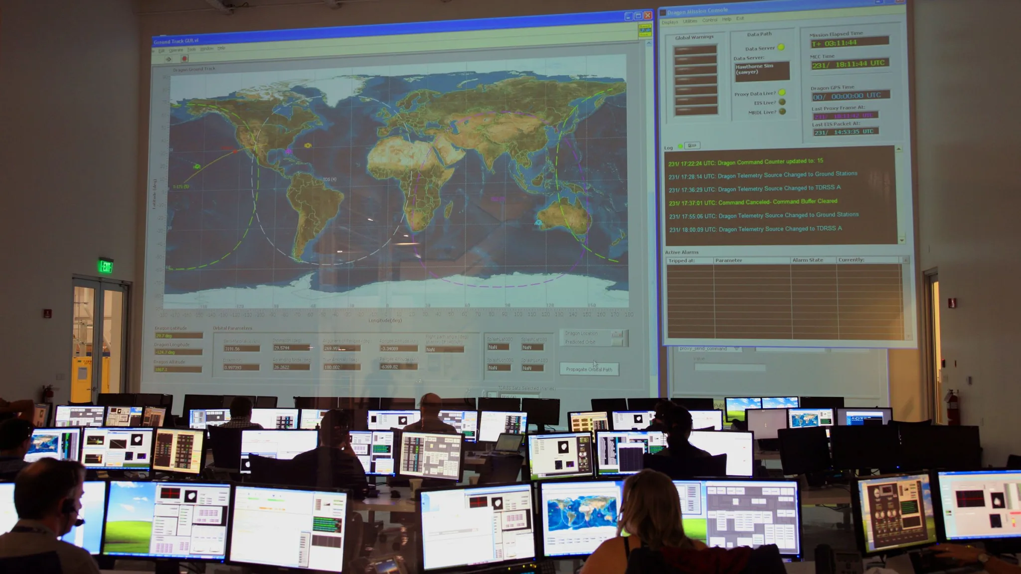 Operations — Flight control room with a large interactive wall map